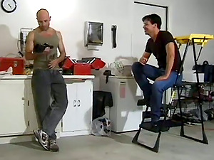 Two homosexual studs dangle out in the garage and end up fucking
