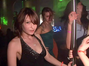 A joy loving fledgling female pulls down her top and flashes in the club