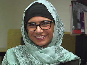 A insatiable Arab dame gets naked and frigs in a public library