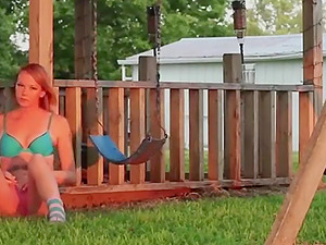 Fingering my pussy in my bikini at a playground.
